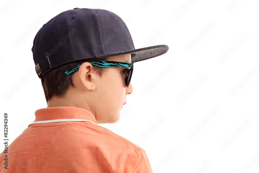Cool little boy with a cap and sunglasses Cool little boy with a cap and sunglasses