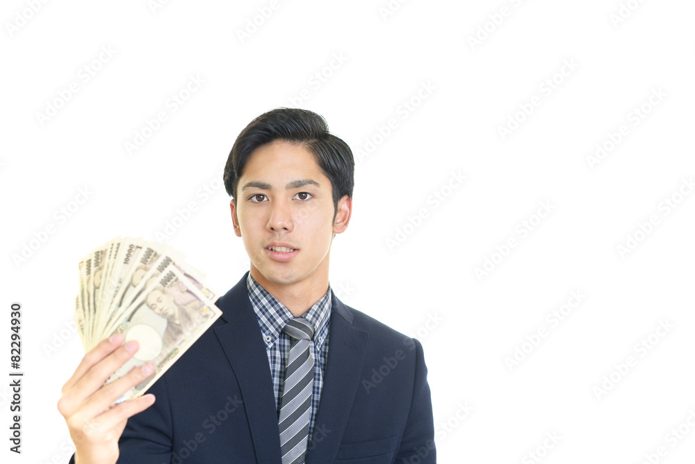 札束を持つ男性 札束を持つ男性