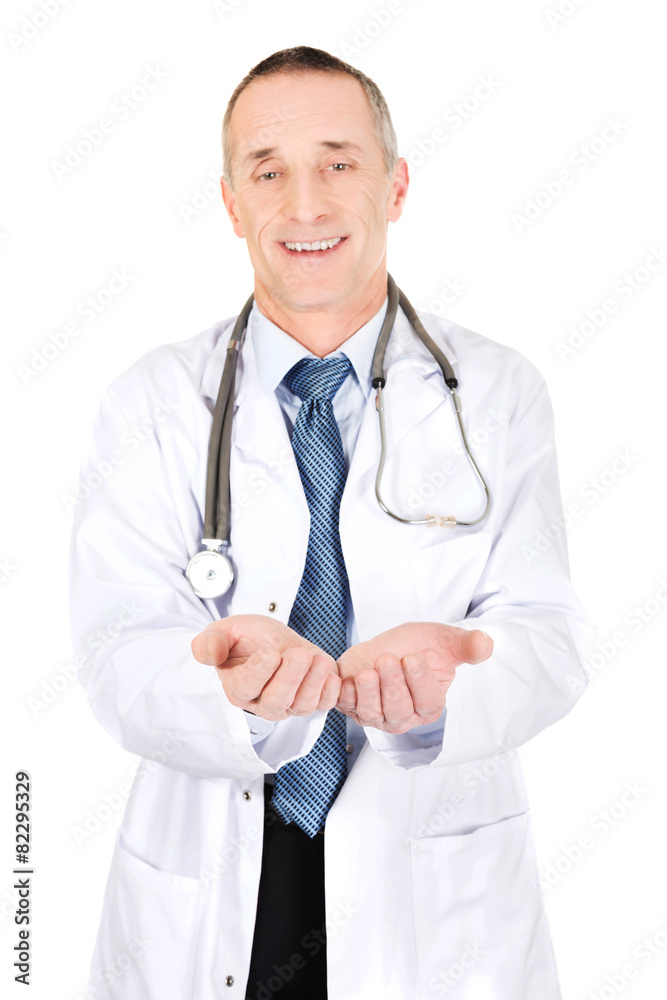 Mature male doctor with open hands Mature male doctor with open hands