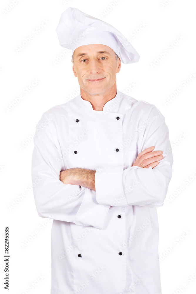 Male chef standing with folded arms