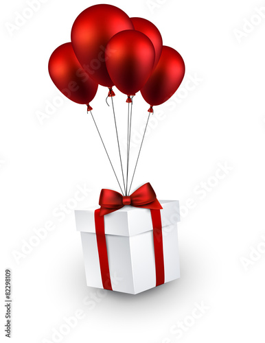 Gift box on red balloons.