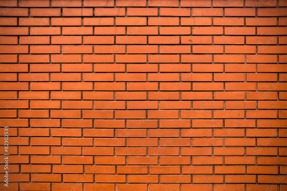 background of orange brick wall close up background of orange brick wall close up