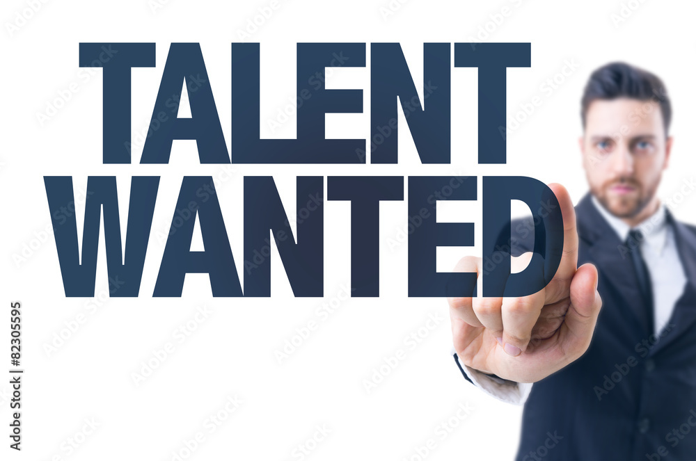 Business man pointing the text: Talent Wanted Business man pointing the text: Talent Wanted