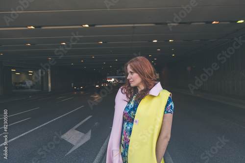 Beautiful girl posing in the city streets