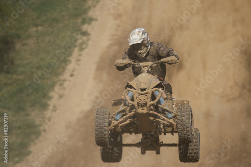 Front view of quad racer jumping