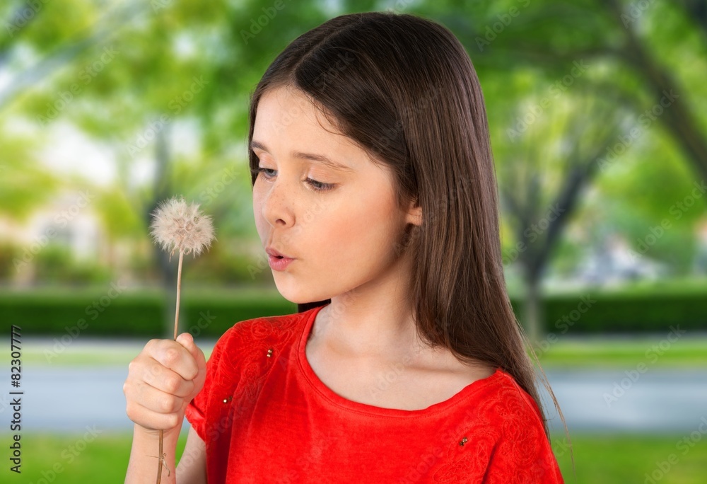 Child. Beautiful blond kid blow dandelion outdoor Child. Beautiful blond kid blow dandelion outdoor