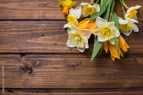 Background with fresh daffodils and tulips