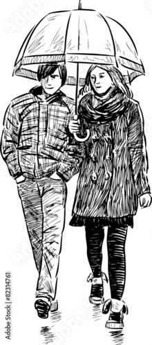 young couple under umbrella