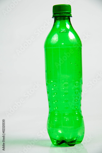 plastic green bottle on white  backgrond