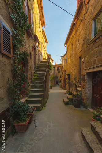 Italian old ancient alley in the medieval Tuscan town