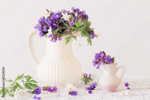 bouquet of spring flowers in a jug