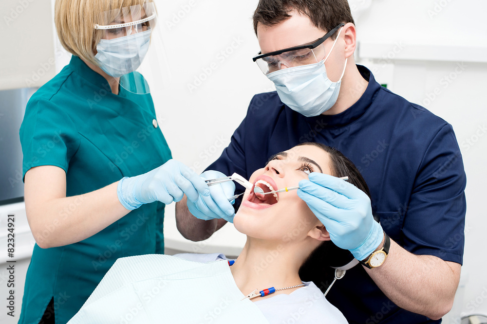 Young woman undergoing a dental check