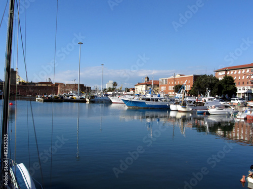 Pier fishing boats moored