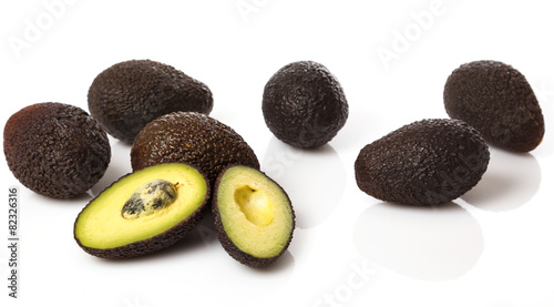 Pile of small avocados