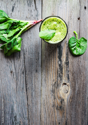 vitamin fresh, green smoothie with spinach, banana in a glass