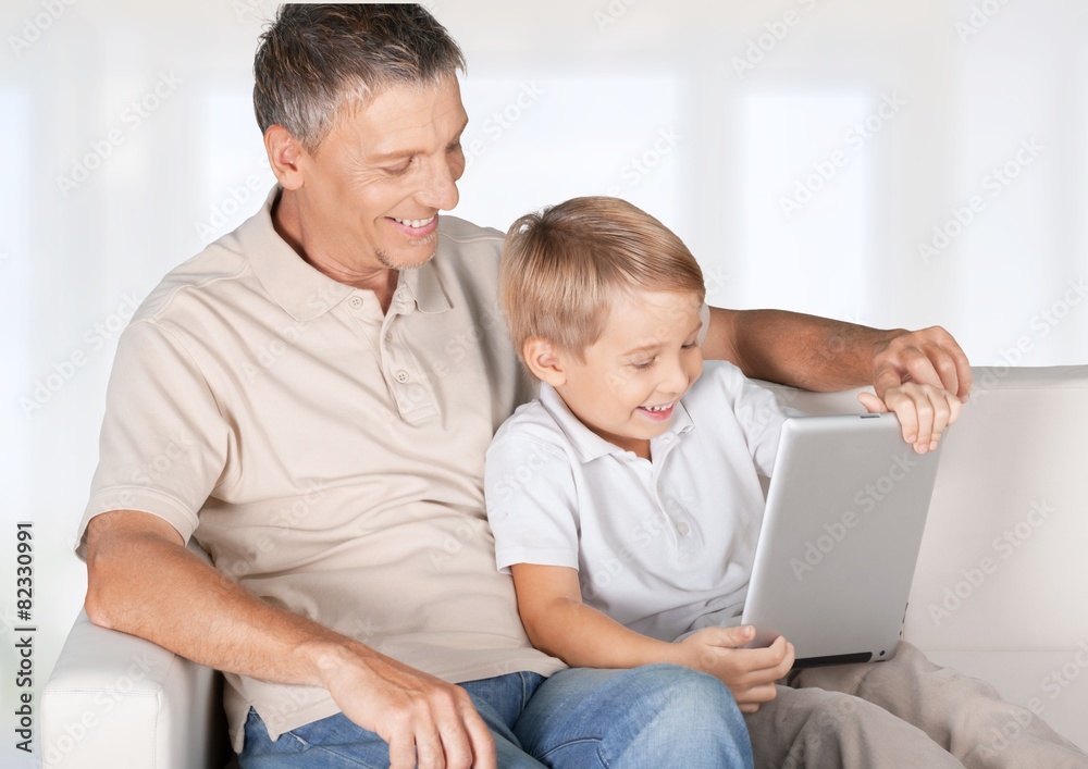 Phone. Little boy with dad playing with smartphone Phone. Little boy with dad playing with smartphone
