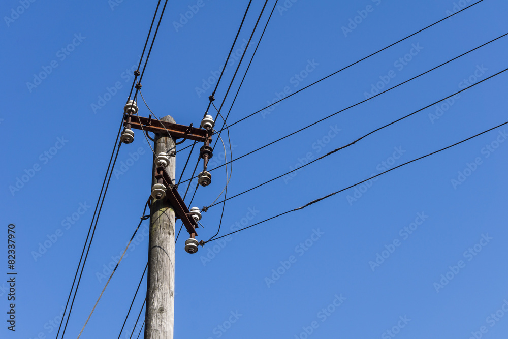 Wooden electric pole with wires Wooden electric pole with wires