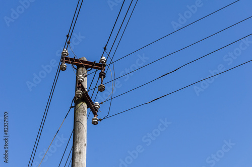 Wooden electric pole with wires
