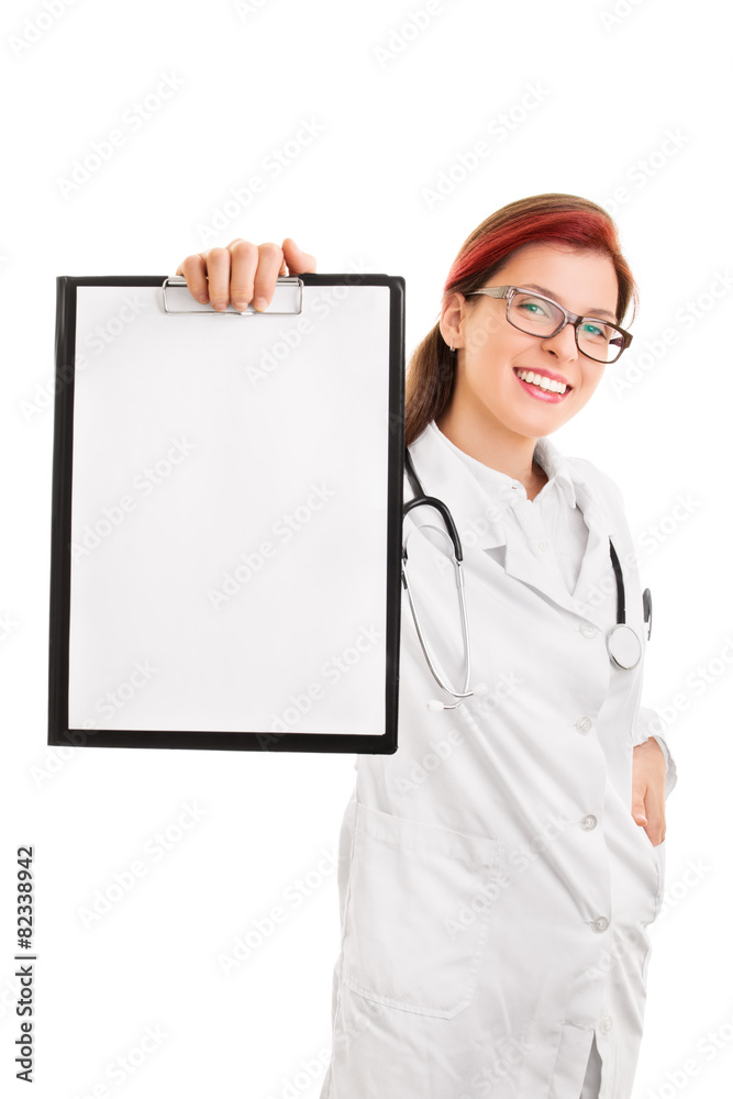 Smiling young doctor holding up a blank notepad Smiling young doctor holding up a blank notepad