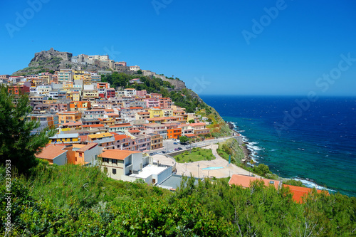 Canvas Print Colorful houses and a castle of Castelsardo town