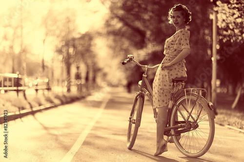 Vintage sepia portrait of a girl hipster concept photo
