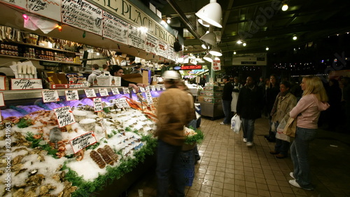 A busy outdoor market at night photo