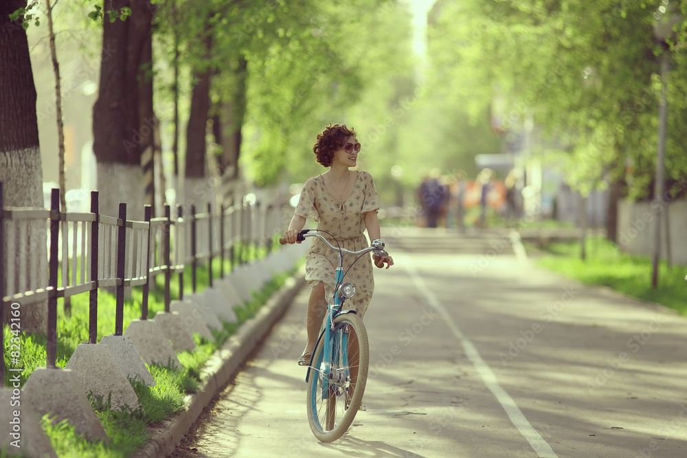 girl on a bicycle spring morning