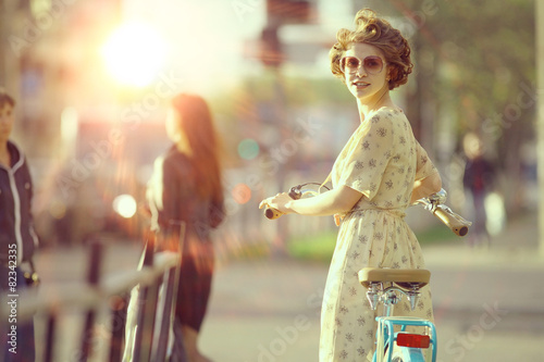 Vintage sepia portrait of a girl hipster concept