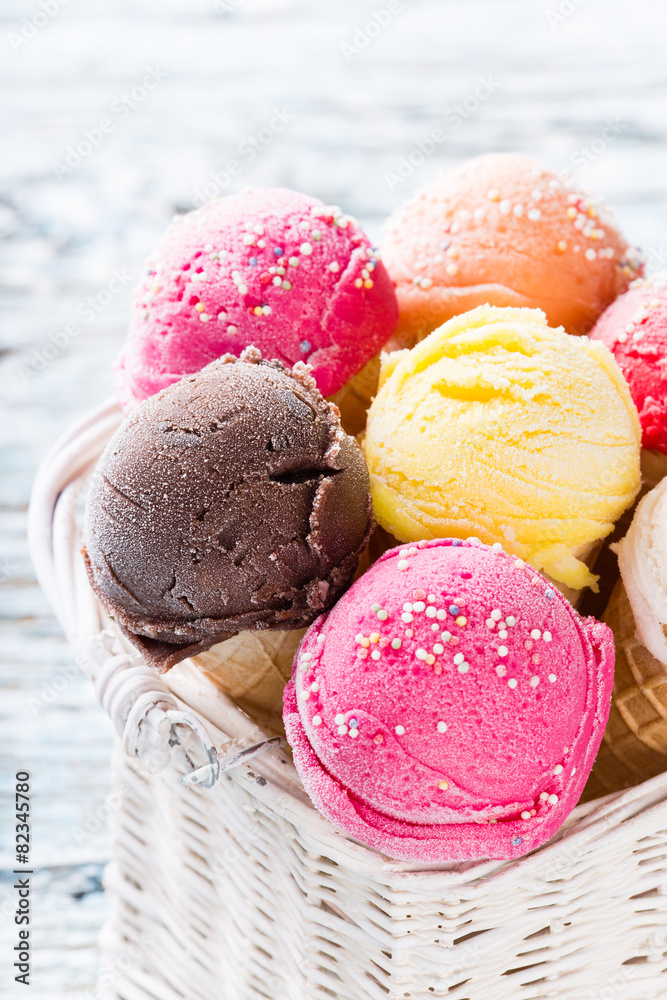 Ice cream scoops on wooden table. Ice cream scoops on wooden table.