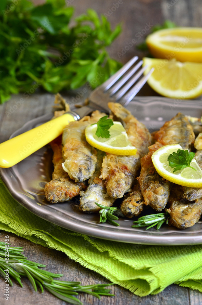 Fried capelin with lemon and herbs. Fried capelin with lemon and herbs.