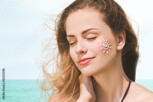 Sunscreen. Suntan Lotion Woman Applying Sunscreen Solar Cream