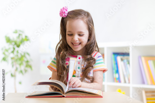 little student girl studyin...