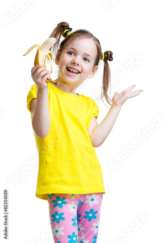 cute little girl eating banana