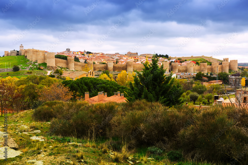 view of Avila with  town walls in autumn