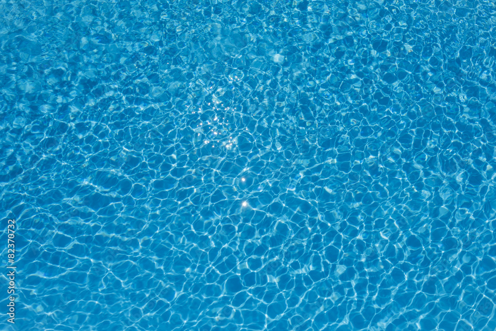 Bright water surface in swimming pool