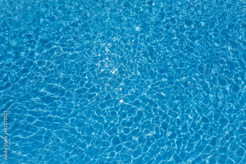 Bright water surface in swimming pool