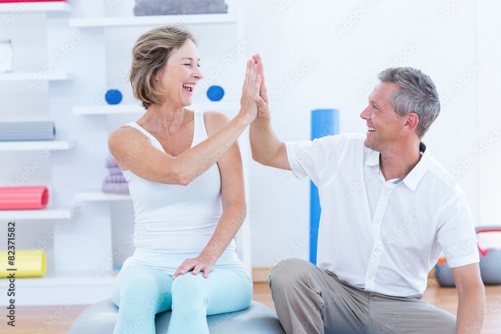 Fototapeta premium Doctor and patient smiling at each other