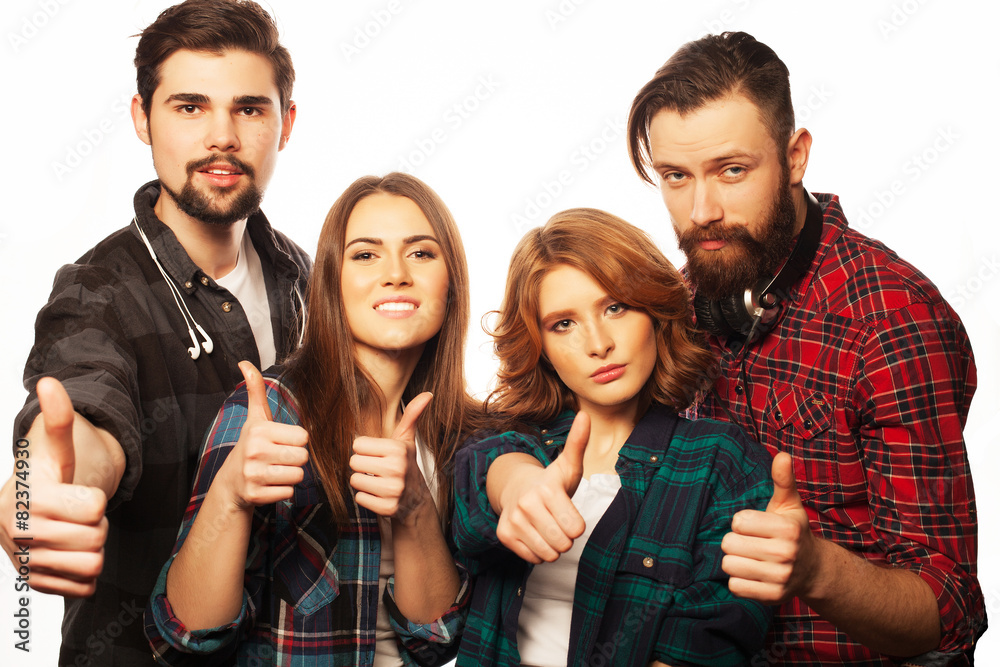 Obraz premium group of happy young men and women