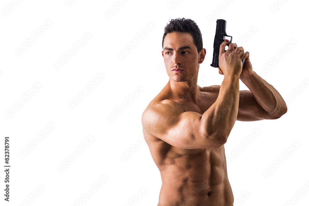 Fototapeta premium Athletic Topless Man Holding Handgun Against White