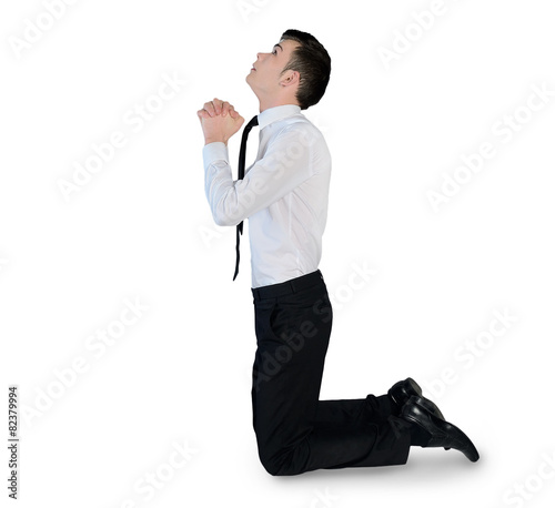 Foto Business man pray looking up