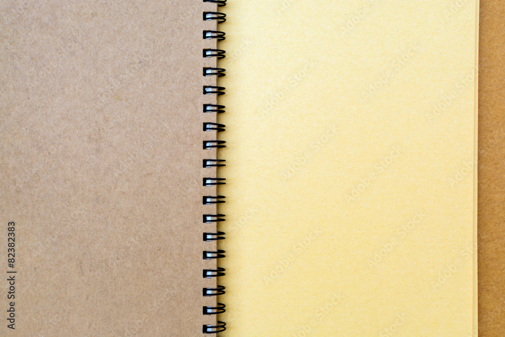 Close up of brown notebook with spiral Close up of brown notebook with spiral
