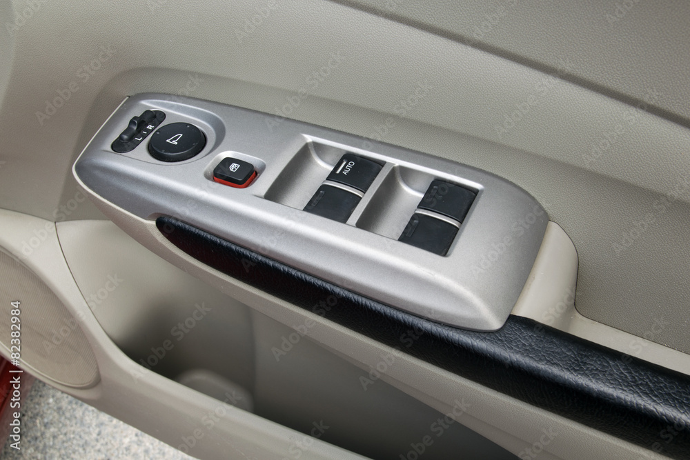 car interior details of door handle with windows controls and ad car interior details of door handle with windows controls and ad