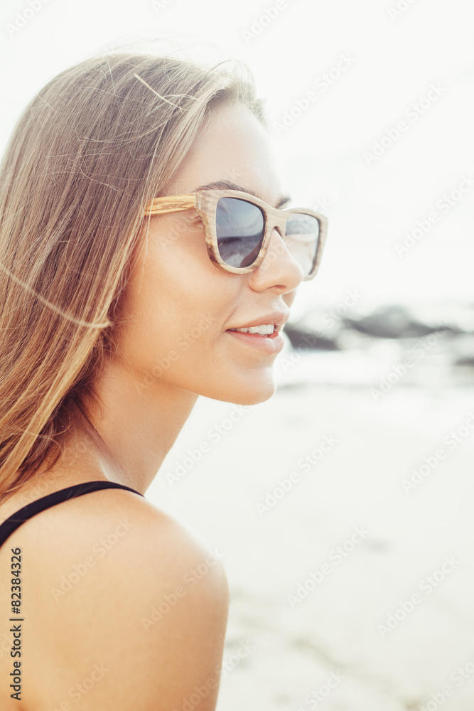 woman fresh face smiling on the beach of tropic island woman fresh face smiling on the beach of tropic island