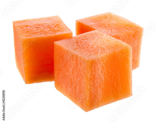 Fresh carrot. Three cubes isolated on white