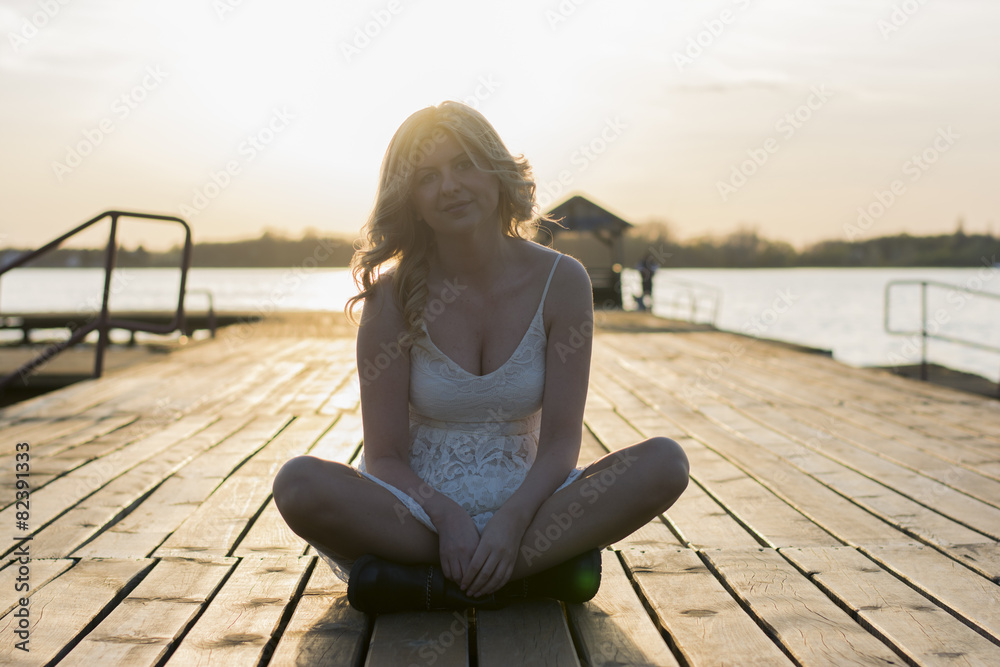 Blond woman in sunset