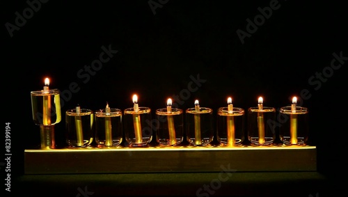 6 flames in Hanukia made of olive oil lanterns photo