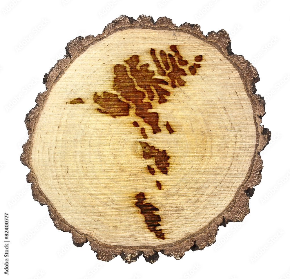 Slice of wood (shape of Faroe Islands branded onto) .(series) Slice of wood (shape of Faroe Islands branded onto) .(series)