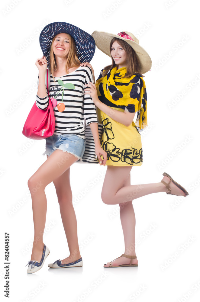 Girls in summer clothing with bags isolated on white Girls in summer clothing with bags isolated on white
