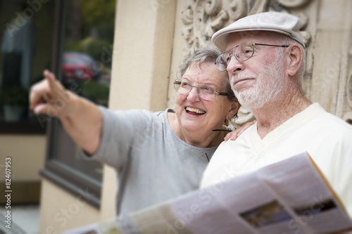 Tourist Senior Couple Looki...