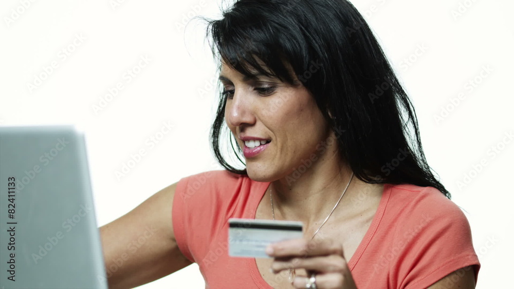 MS Woman using laptop and credit card / Orem, Utah, USA MS Woman using laptop and credit card / Orem, Utah, USA